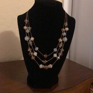 Beaded multi strand necklace